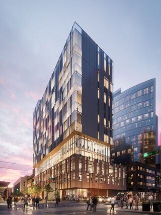 A modern architectural design featuring a tall, glass-paneled building with vibrant sunset hues and bustling pedestrians below.